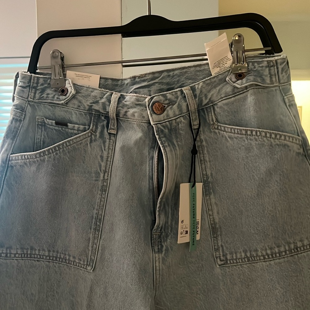 Brand new with tags. Very stylish high ride wide leg